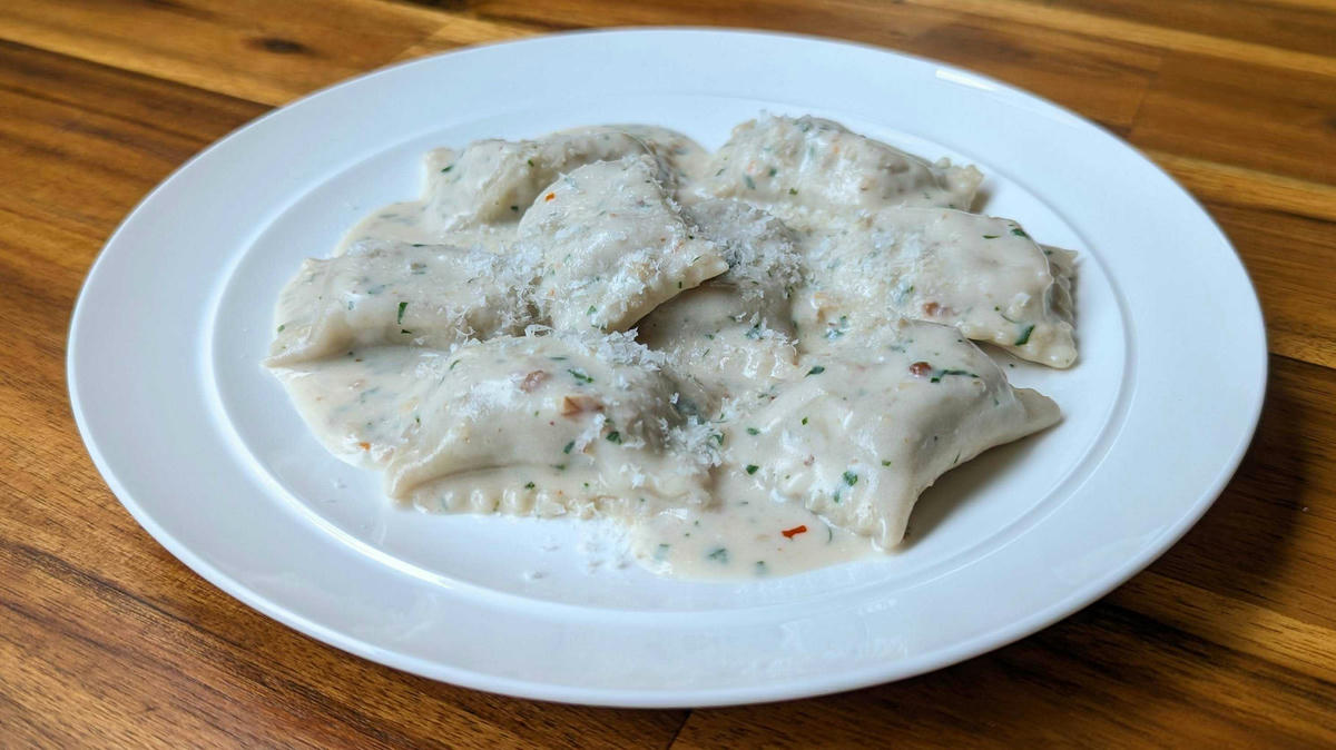 Mushroom Agnolotti w/Cream Sauce